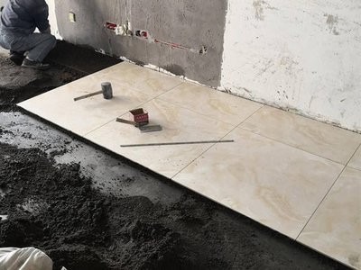 西安装修瓷砖铺设到底用水泥黄沙还是用瓷砖粘合剂？